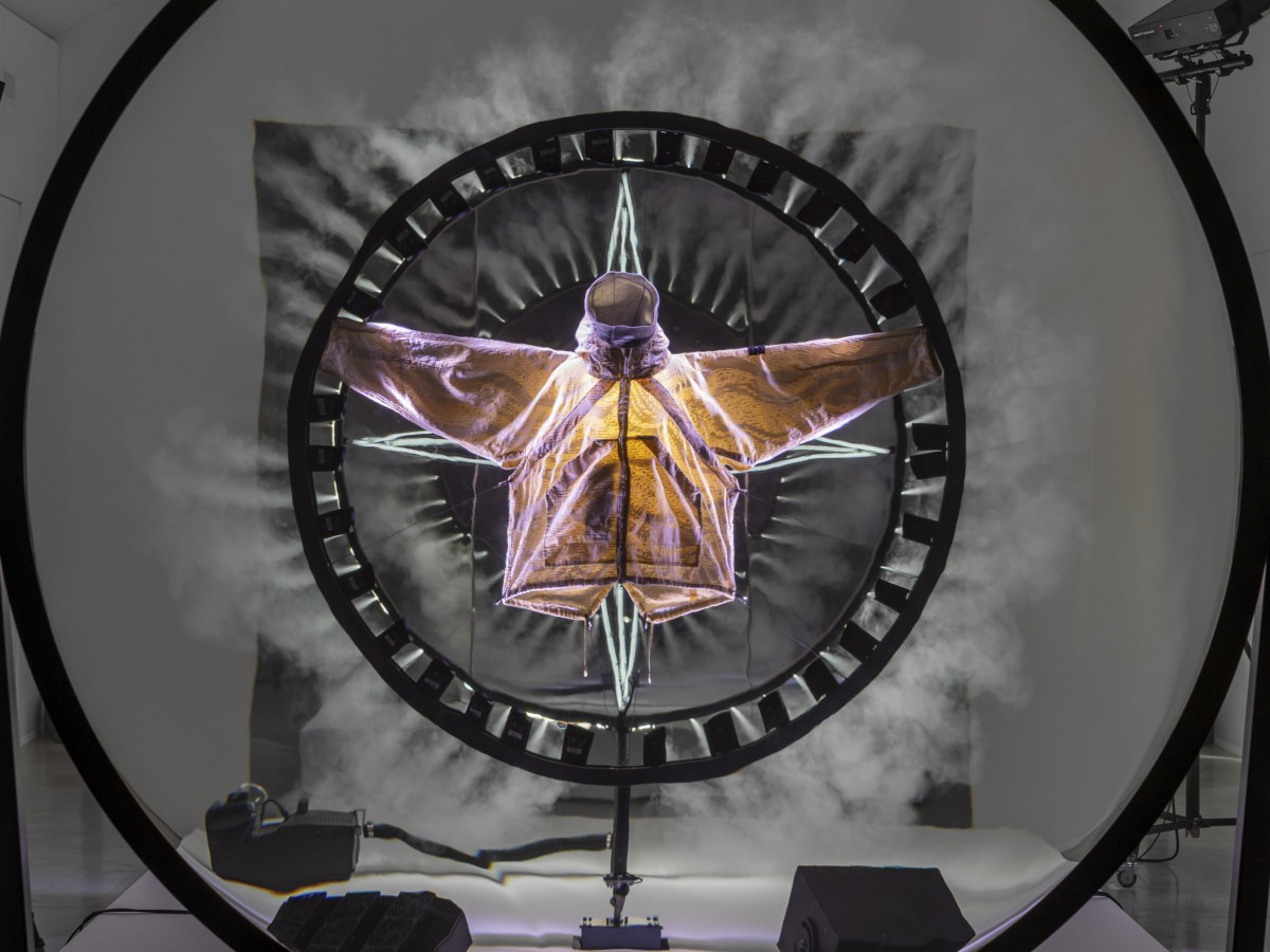 Revealing a research textile through light, smoke and motion.