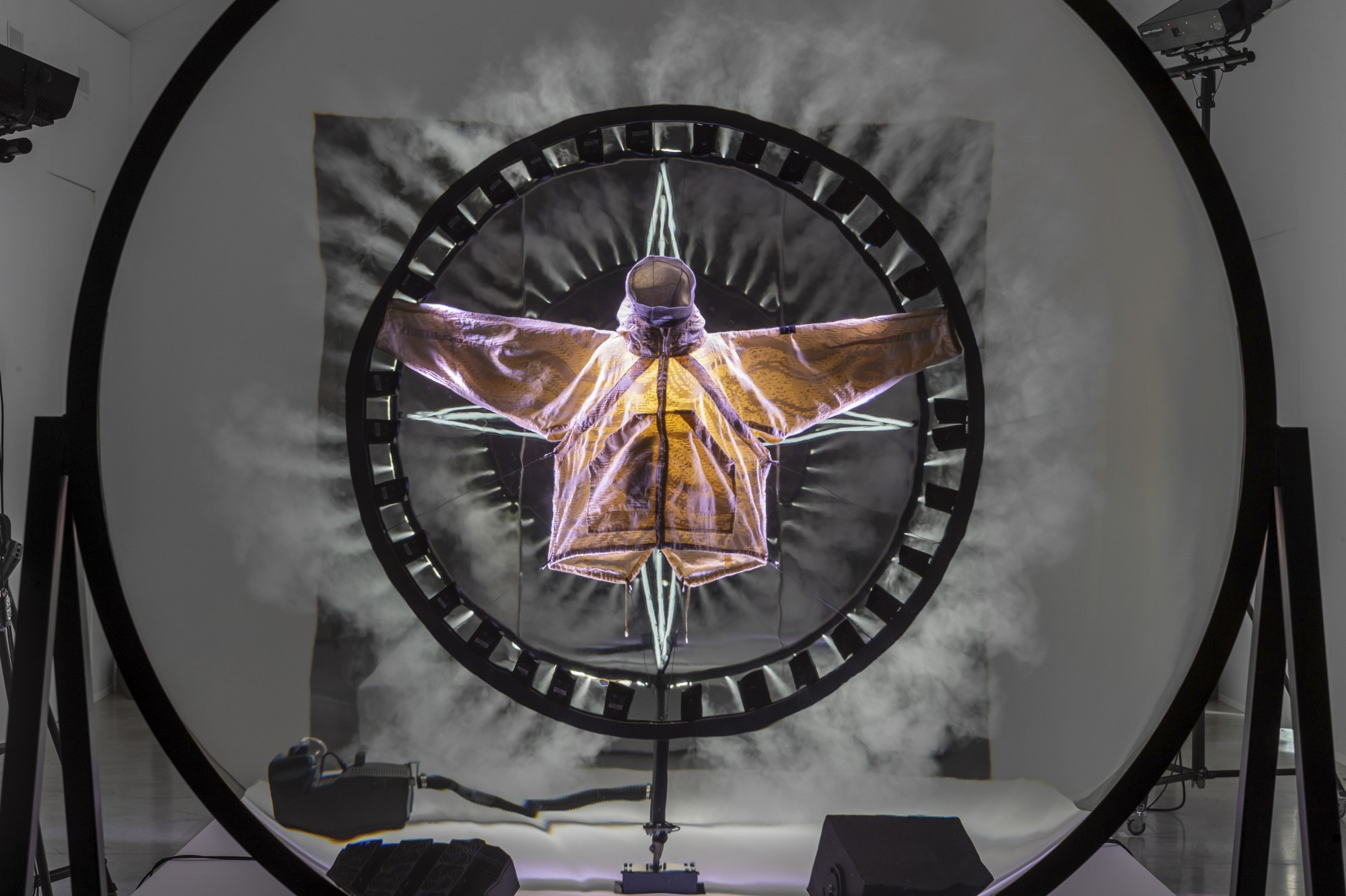 Revealing a research textile through light, smoke and motion.